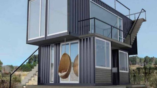 Casa moderna construida con contenedores marítimos reciclados, ubicada en un entorno residencial.
